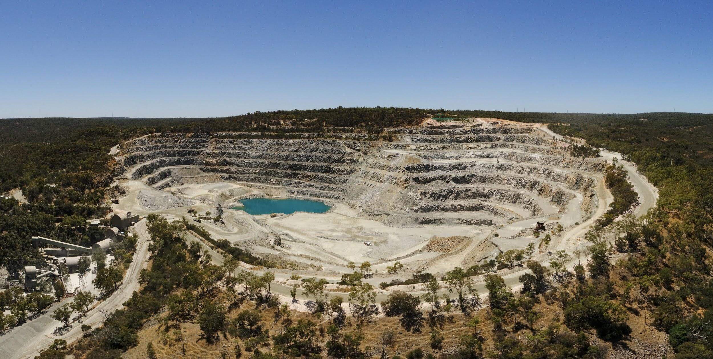 Aerial view of a hard-rock quarry with a pit lake near Perth