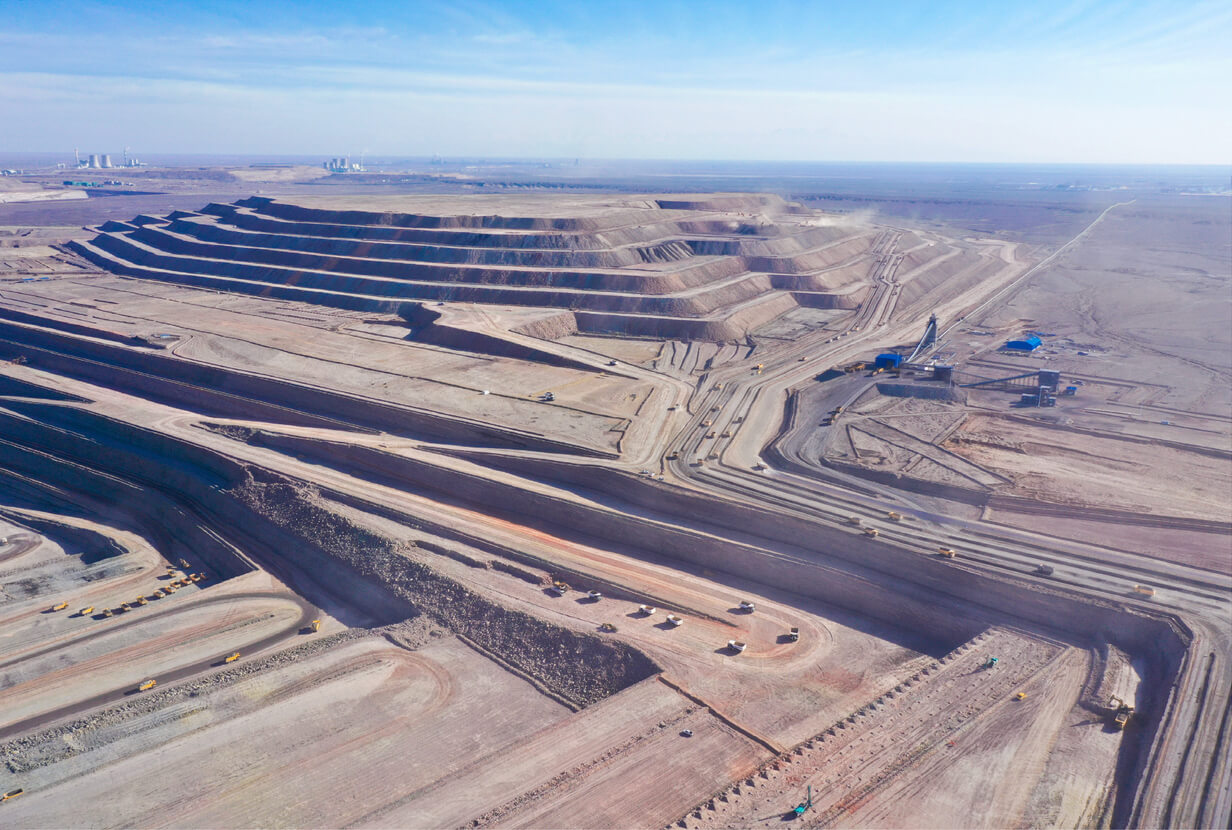In-pit primary crusher and overland conveyor at China Pit, supporting autonomous mine operations